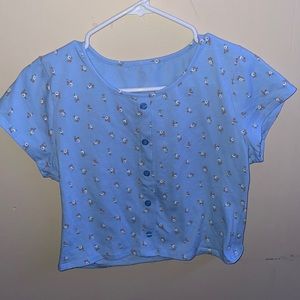 Blue shirt with flowers